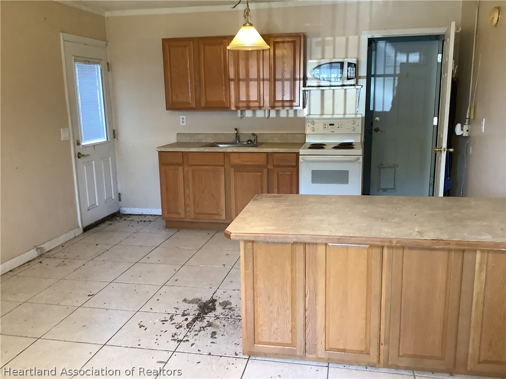 1123 Forest Road Sebring, FL 33872 - Photo 11 of 11 ADU is studio bedroom/ living room/ kitchenette