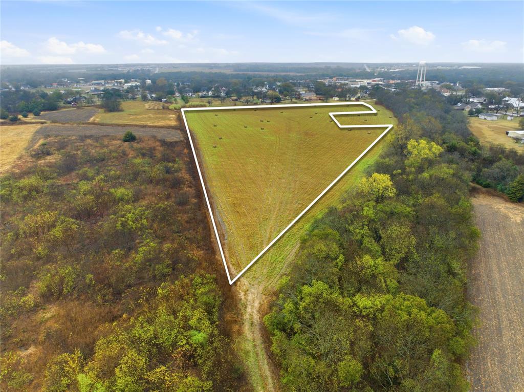 Tbd East Travis Street Italy, TX 76651 - Photo 2 of 9 an aerial view of residential houses with outdoor space and swimming pool