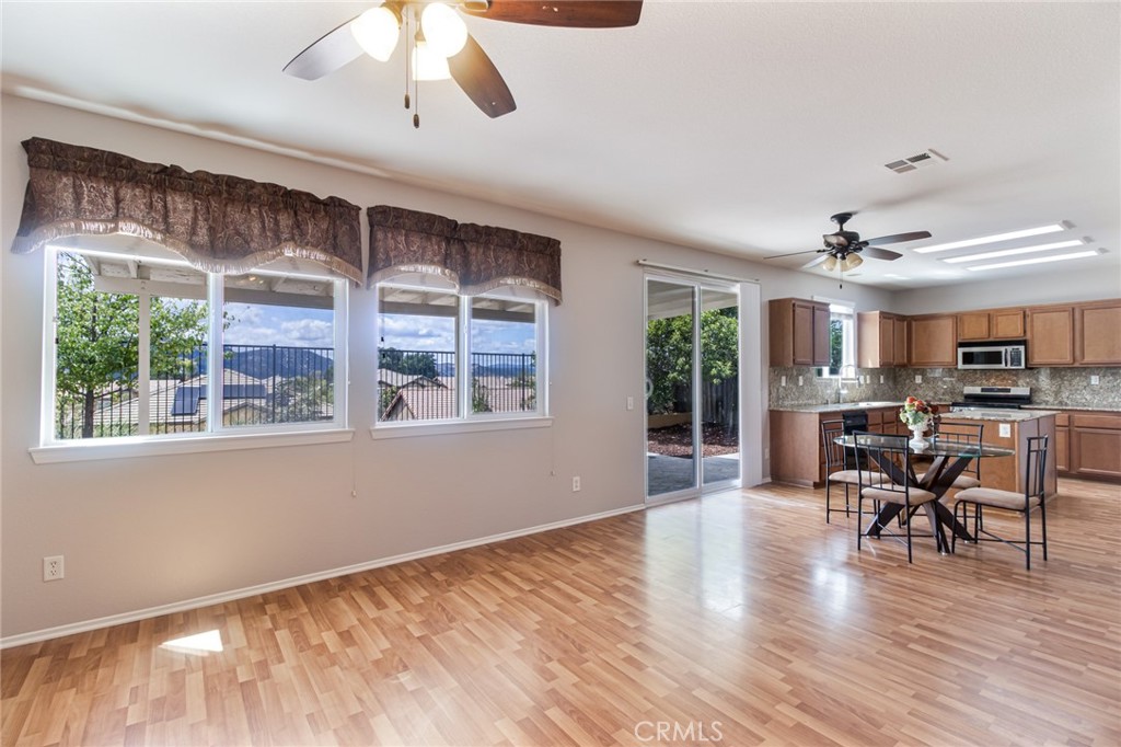 46321 Sharon Street Temecula, CA 92592 - Photo 13 of 40 a view of a livingroom with furniture window and wooden floor