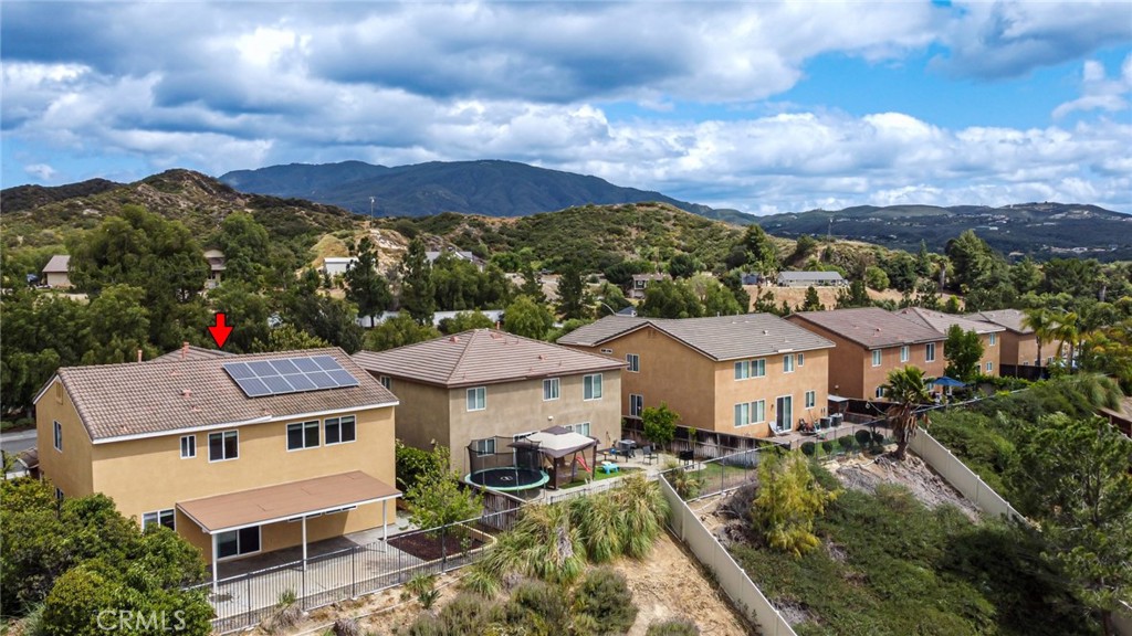 46321 Sharon Street Temecula, CA 92592 - Photo 9 of 40 a aerial view of multiple houses with a yard