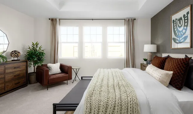 a bathroom with a double vanity sink mirror and shower