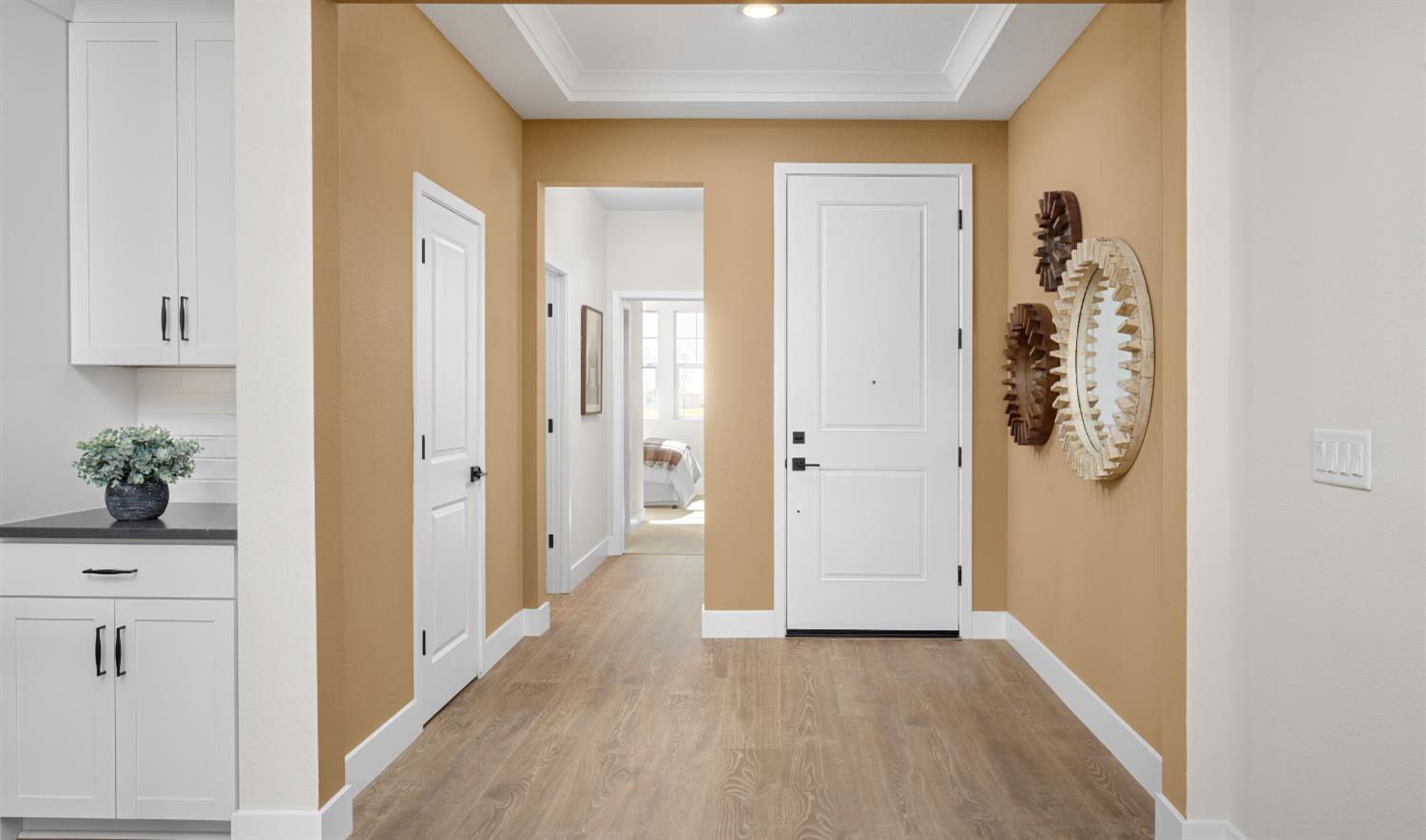 4452 Doric Way Rancho Cordova, CA 95742 - Photo 10 of 15 a view of a hallway with bathroom and wooden floor