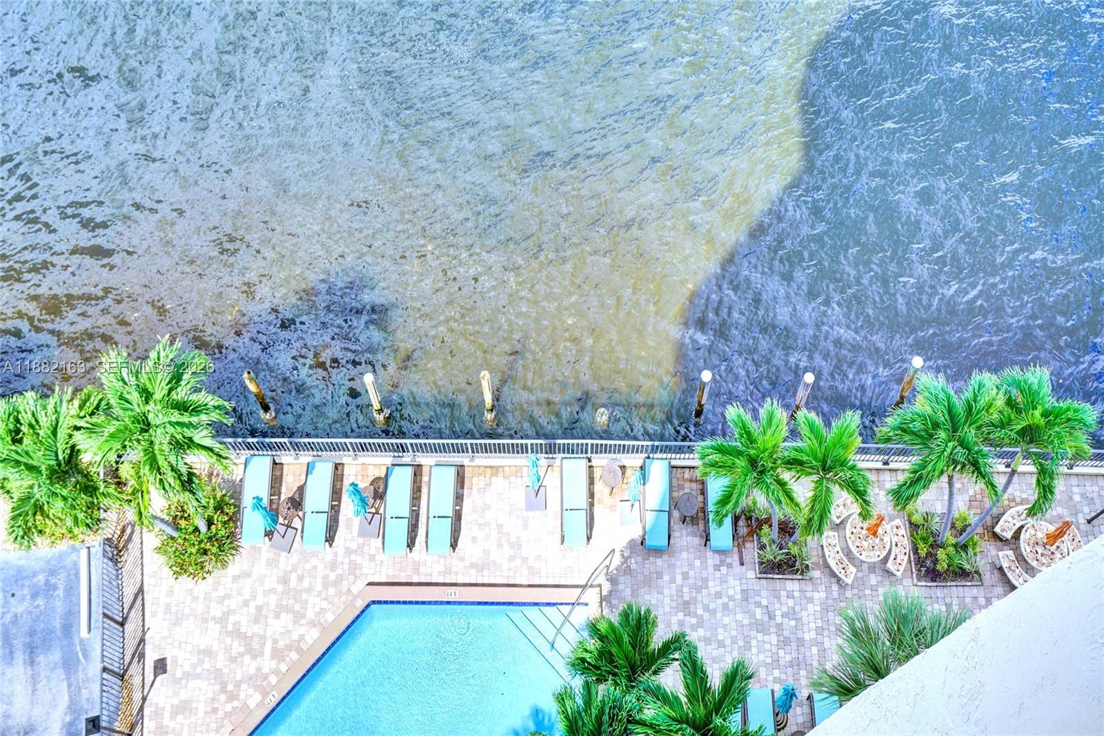 501 North Riverside Drive, Unit PH2 Pompano Beach, FL 33062 - Photo 20 of 83 a view of a porch with a yard