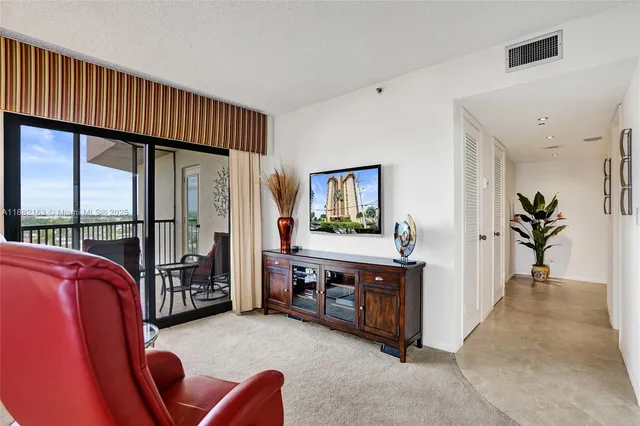 a bathroom with a tub and a sink