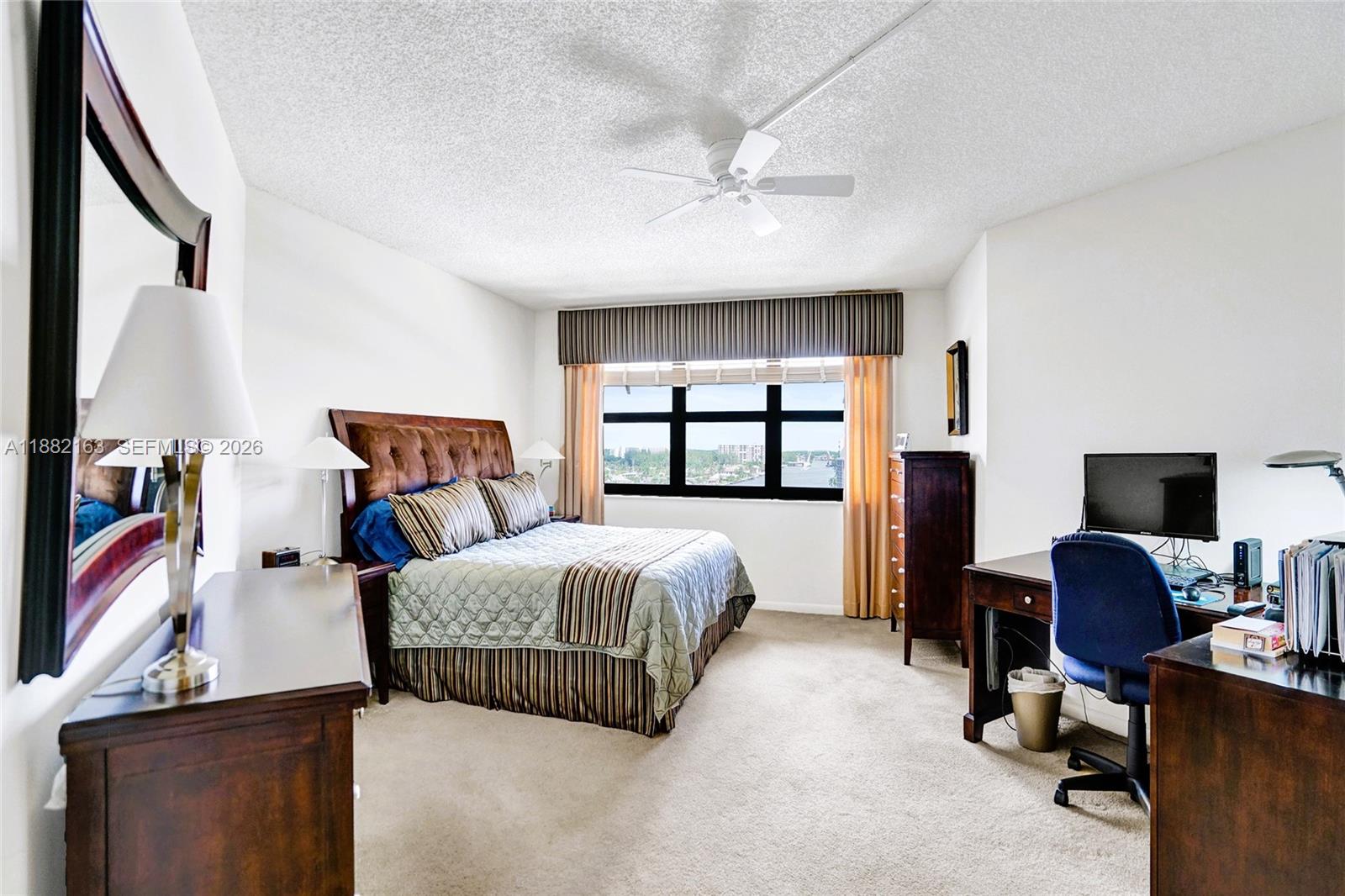 501 North Riverside Drive, Unit PH2 Pompano Beach, FL 33062 - Photo 34 of 83 a bedroom with double bed and a window