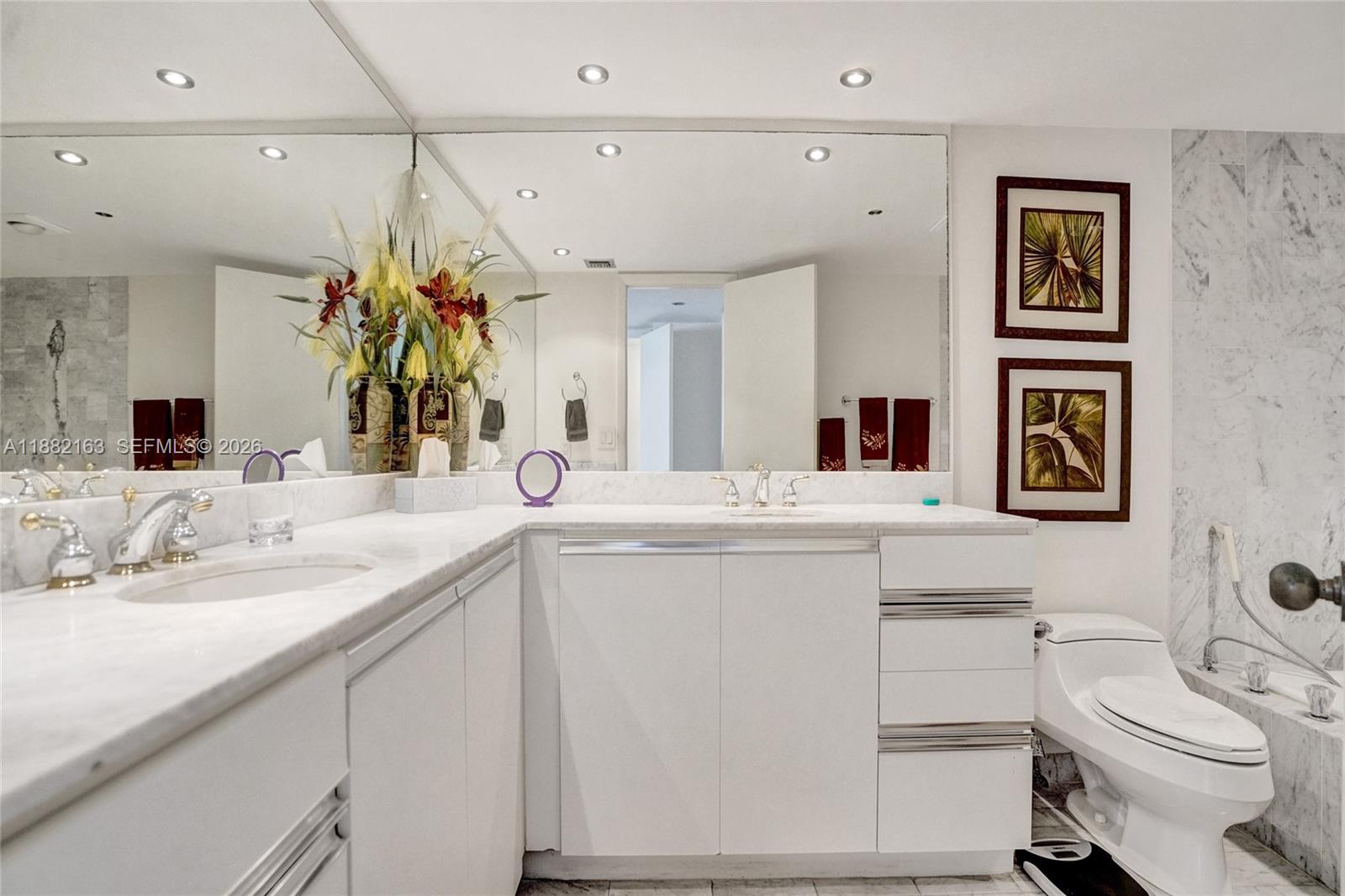 501 North Riverside Drive, Unit PH2 Pompano Beach, FL 33062 - Photo 38 of 83 a bathroom with a sink vanity granite and toilet