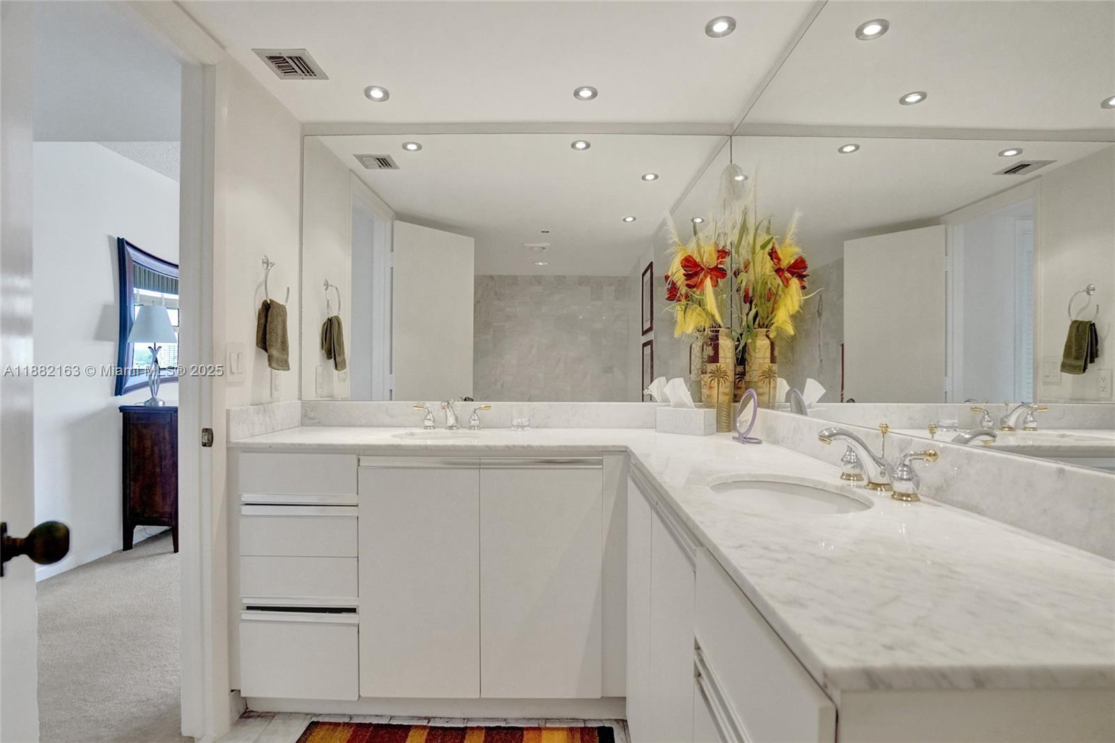 501 North Riverside Drive, Unit PH2 Pompano Beach, FL 33062 - Photo 38 of 80 a bathroom with a sink vanity granite and a mirror