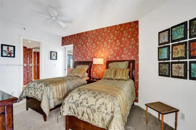 a view of swimming pool with outdoor seating and plants