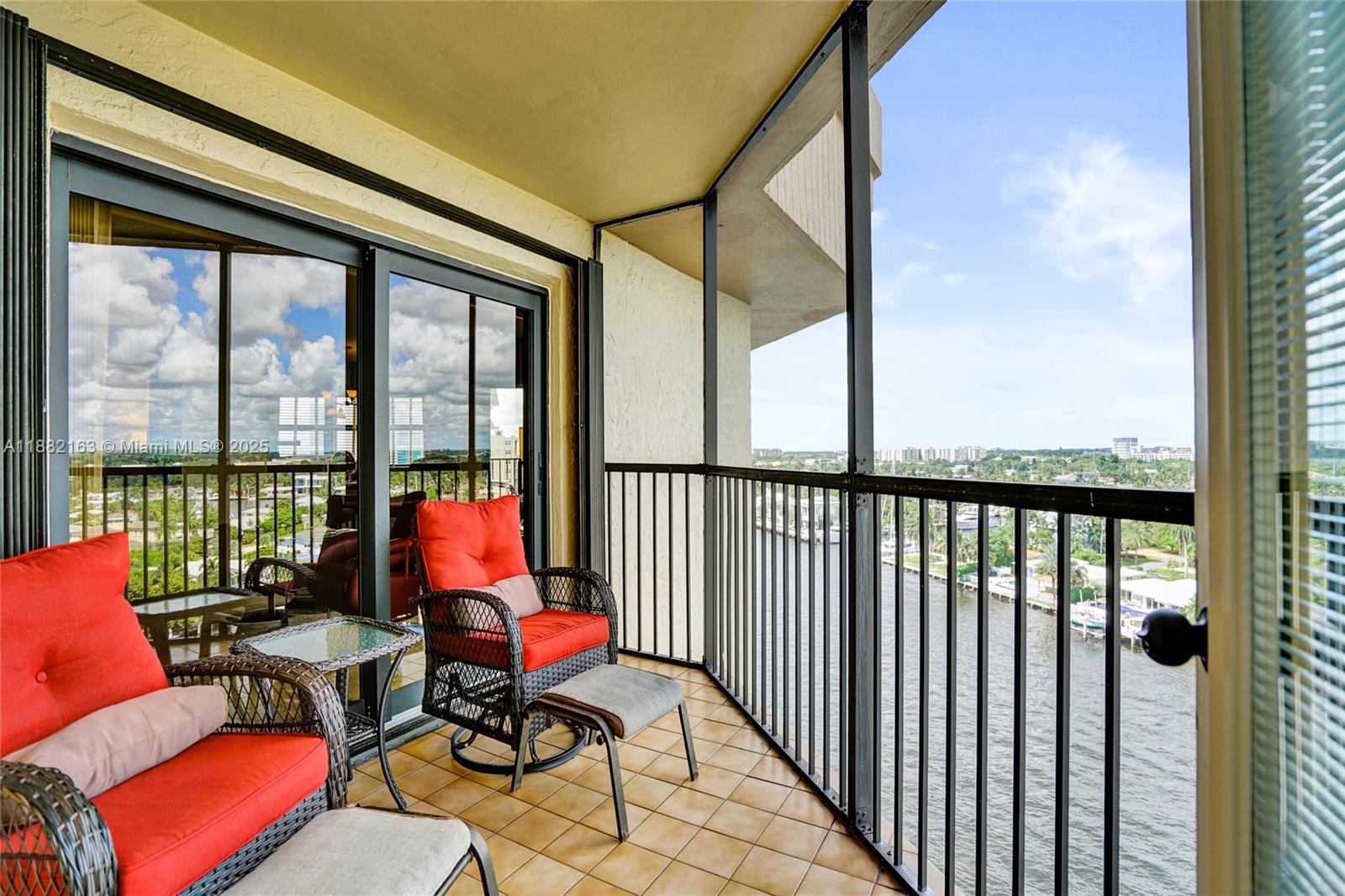 501 North Riverside Drive, Unit PH2 Pompano Beach, FL 33062 - Photo 48 of 80 a living room filled with furniture and a floor to ceiling window