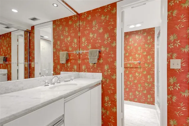 a view of a lake with a building in the background