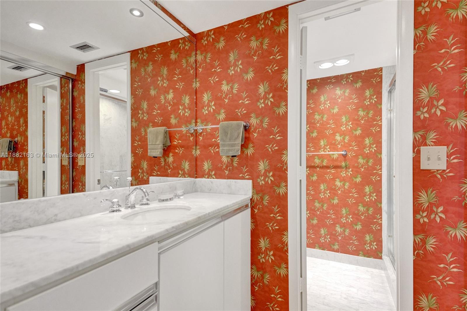 501 North Riverside Drive, Unit PH2 Pompano Beach, FL 33062 - Photo 50 of 80 a bathroom with a granite countertop sink and a large mirror