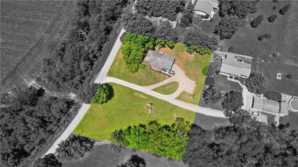 103 Stone Road Dawson, PA 15428 - Photo 25 of 25 an aerial view of a house with a swimming pool
