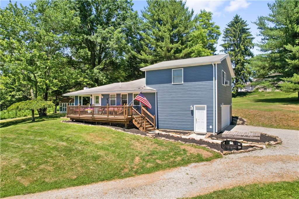 103 Stone Road Dawson, PA 15428 - Photo 3 of 25 a view of a house with a yard