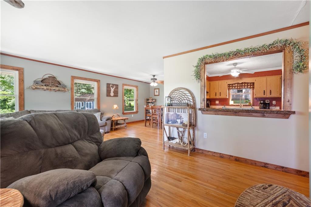 103 Stone Road Dawson, PA 15428 - Photo 5 of 25 a living room with furniture and a large window