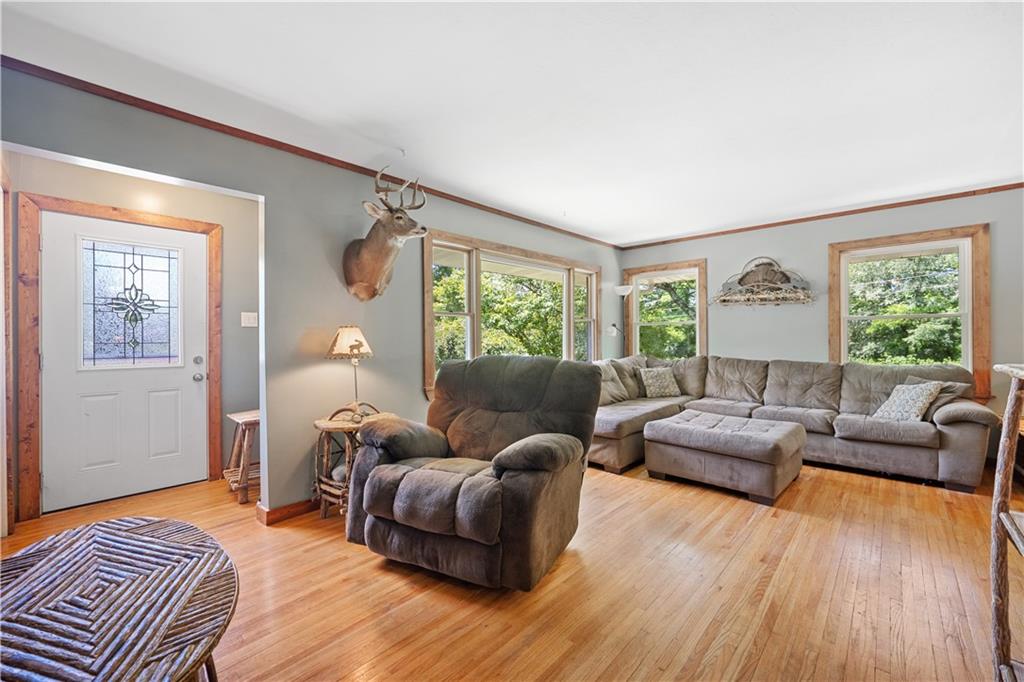 103 Stone Road Dawson, PA 15428 - Photo 7 of 25 a living room with furniture and a large window