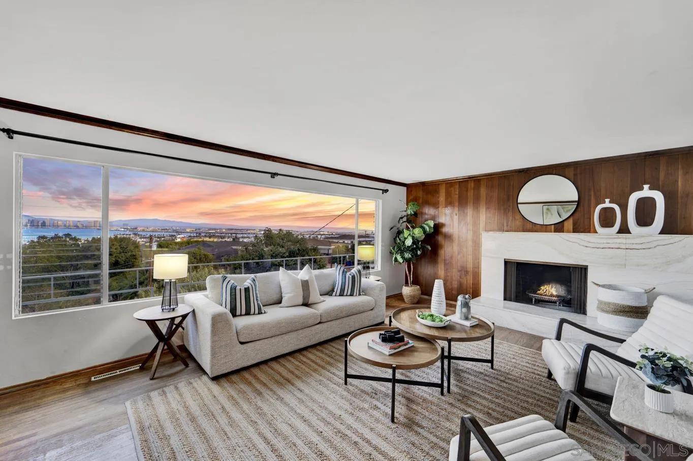 1141 Akron Street San Diego, CA 92106 - Photo 12 of 44 a living room with furniture and a fireplace
