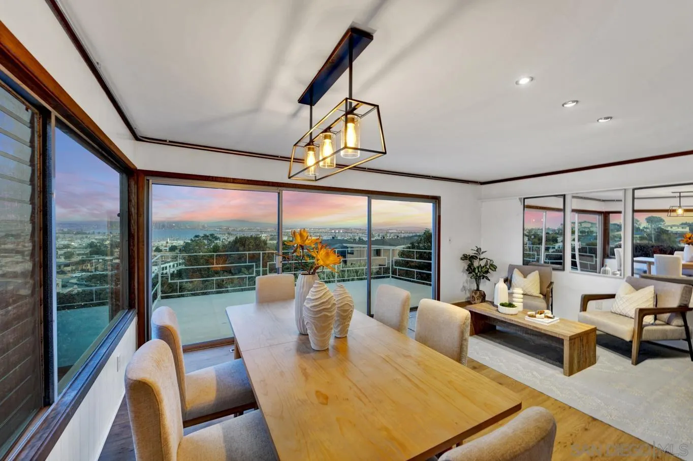 1141 Akron Street San Diego, CA 92106 - Photo 18 of 44 a living room with furniture floor to ceiling windows and a table