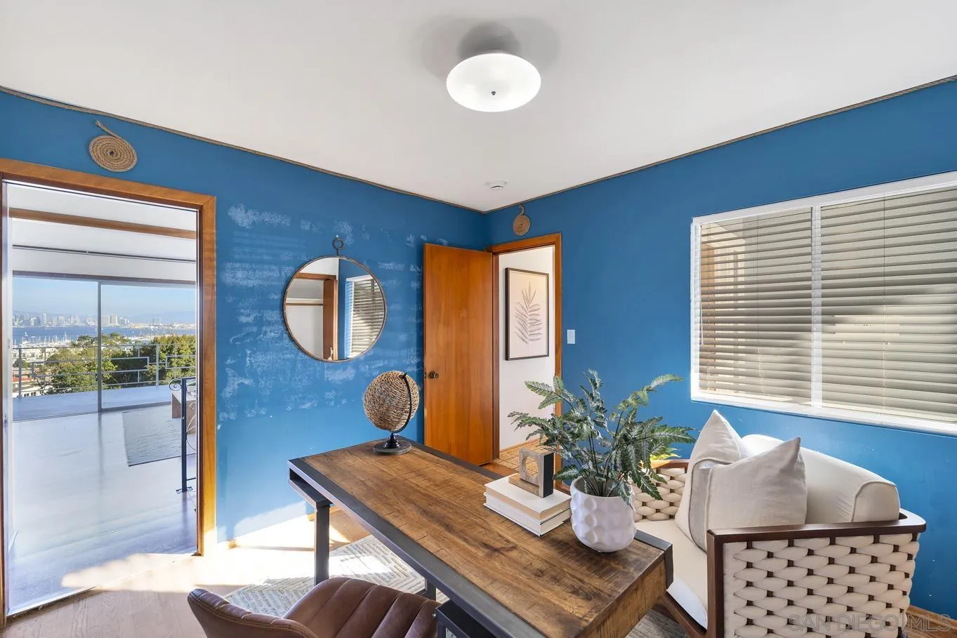1141 Akron Street San Diego, CA 92106 - Photo 26 of 44 a living room with furniture and wooden floor