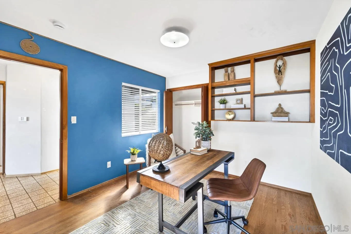 1141 Akron Street San Diego, CA 92106 - Photo 27 of 44 a living room with furniture and a window