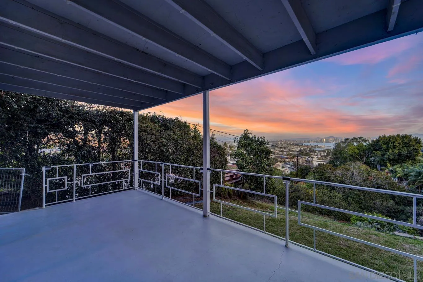 1141 Akron Street San Diego, CA 92106 - Photo 33 of 44 a view of a roof deck with wooden floor and fence