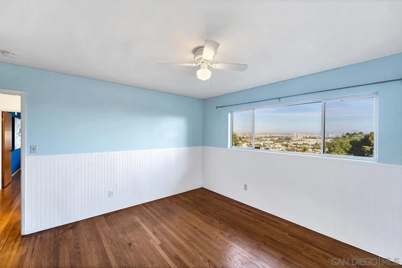 1141 Akron Street San Diego, CA 92106 - Photo 35 of 44 wooden floor in an empty room with a window