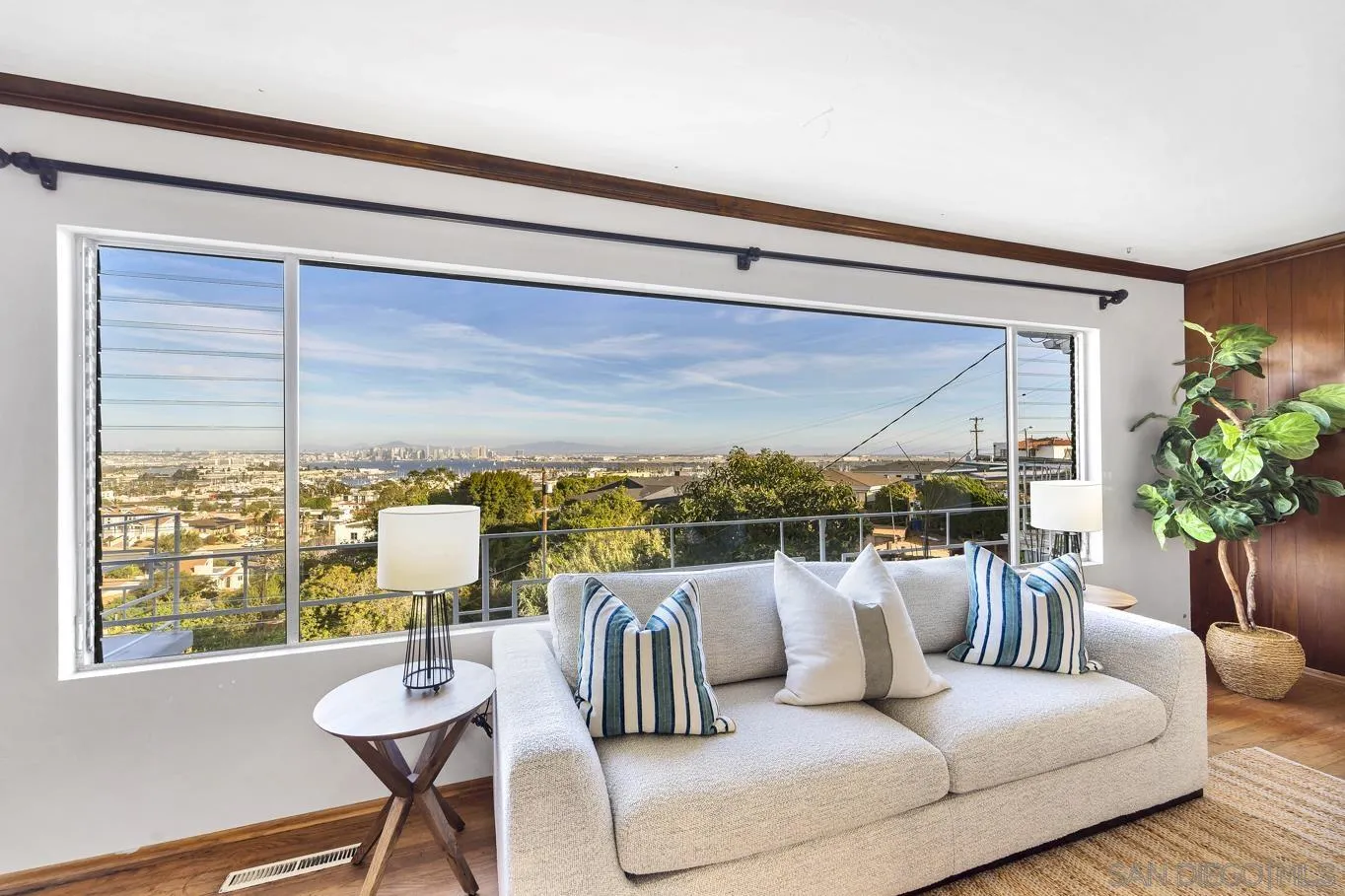 1141 Akron Street San Diego, CA 92106 - Photo 5 of 44 a living room with furniture and a large window