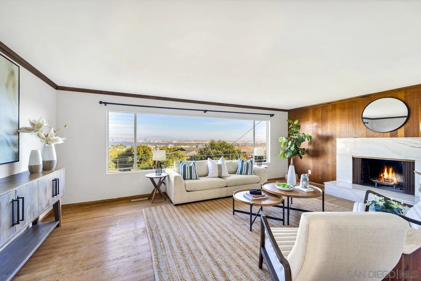 1141 Akron Street San Diego, CA 92106 - Photo 8 of 44 a living room with furniture and a fireplace