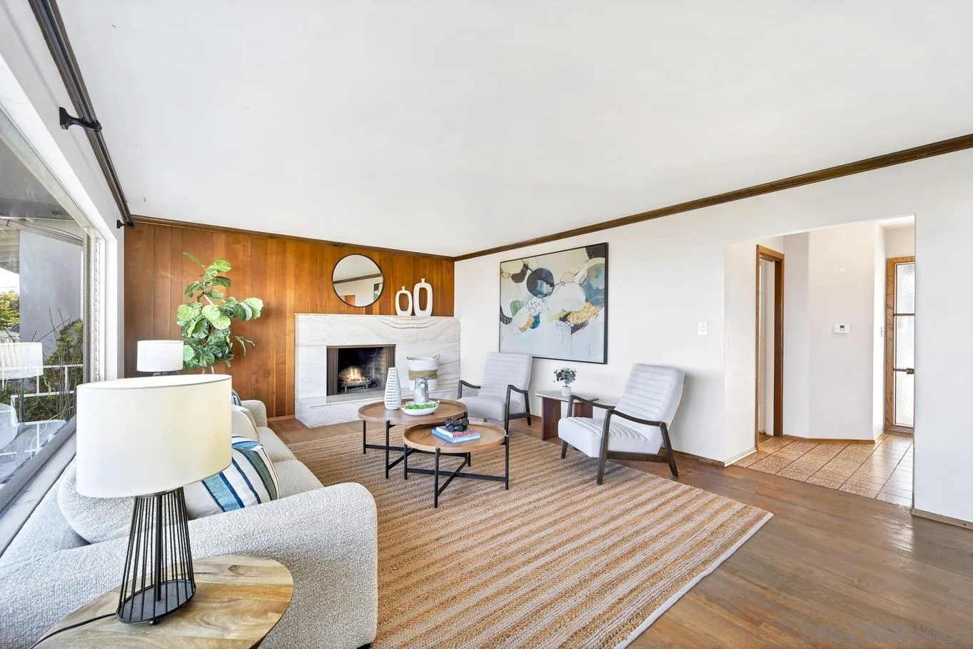 1141 Akron Street San Diego, CA 92106 - Photo 9 of 44 a living room with furniture and a fireplace