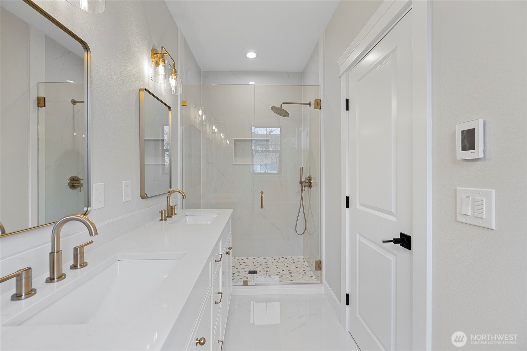 1211 King Street Anacortes, WA 98221 - Photo 26 of 40 a bathroom with a bathtub shower sink and mirror