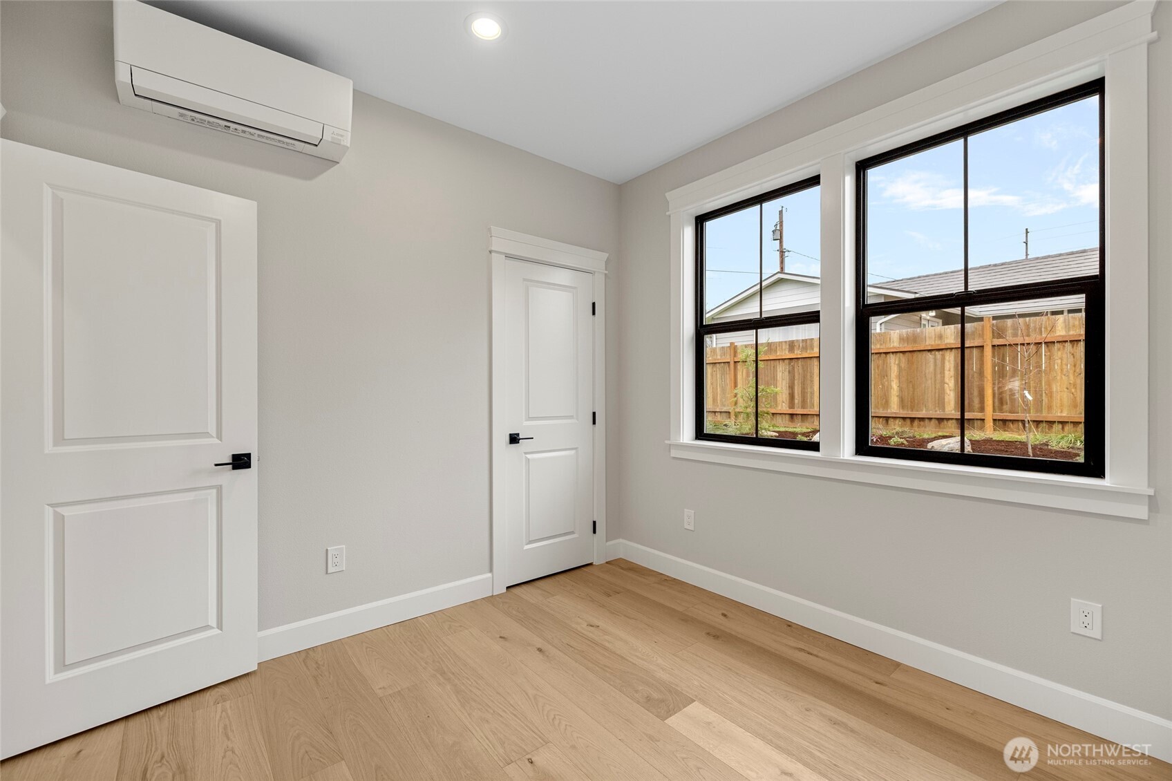 1211 King Street Anacortes, WA 98221 - Photo 27 of 40 a view of an empty room with a window