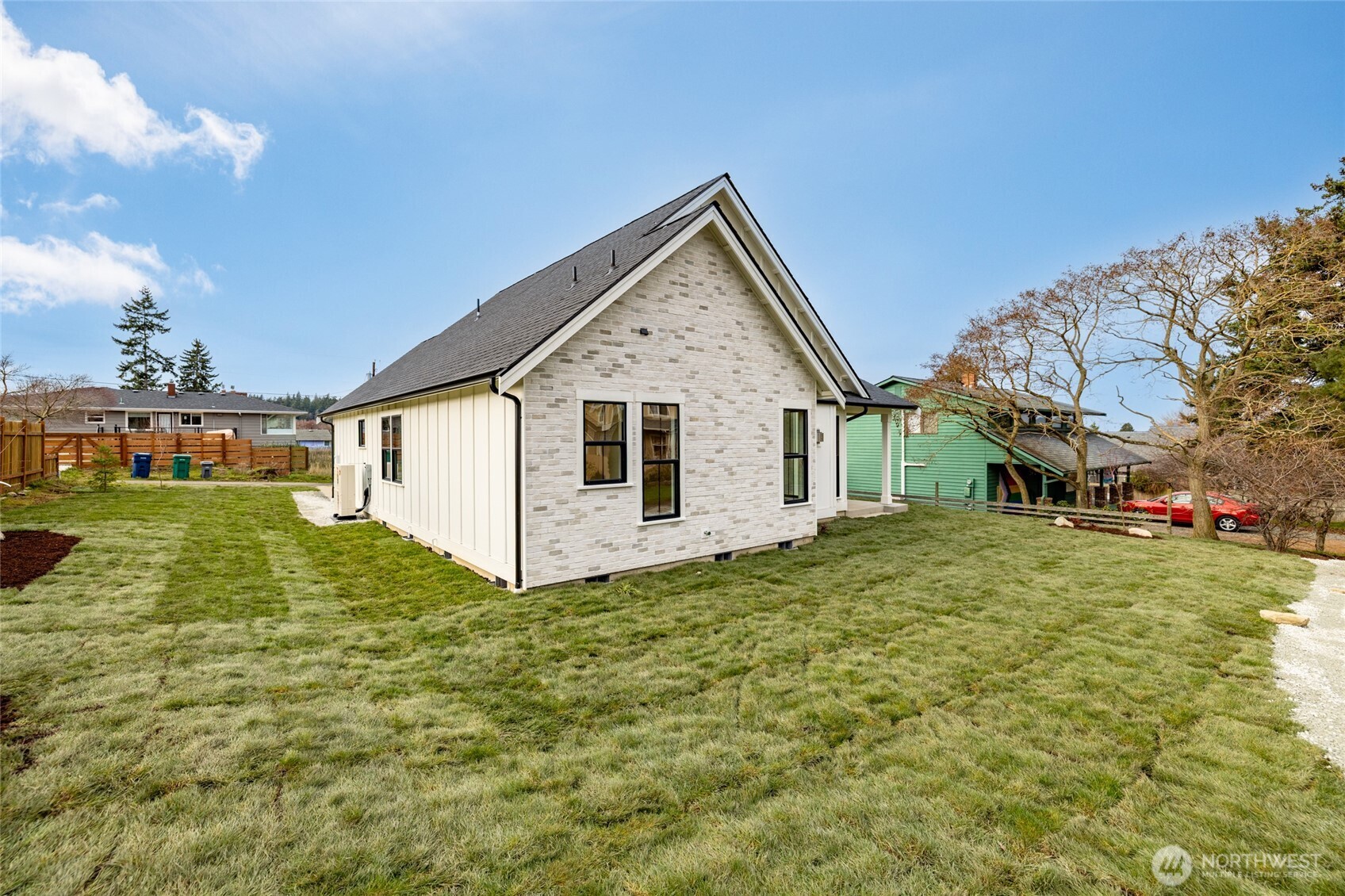 1211 King Street Anacortes, WA 98221 - Photo 38 of 40 a view of a house with a yard