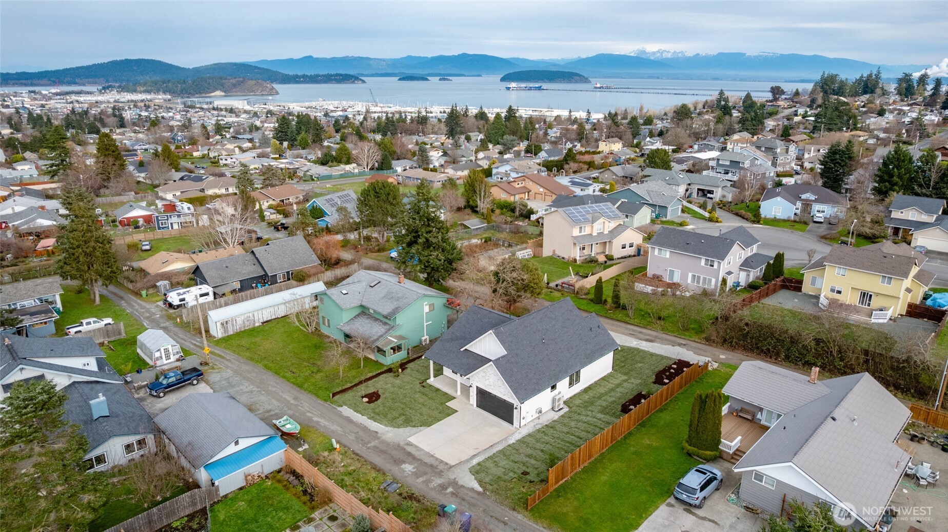 1211 King Street Anacortes, WA 98221 - Photo 4 of 40 an aerial view of residential houses with outdoor space