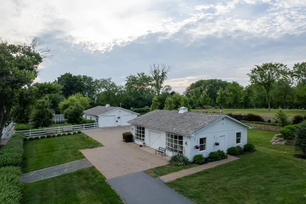 a aerial view of residential houses with outdoor space and entertaining space