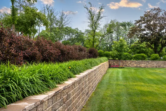 a view of a garden from a balcony