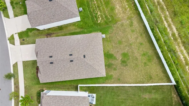 swimming pool with a yard