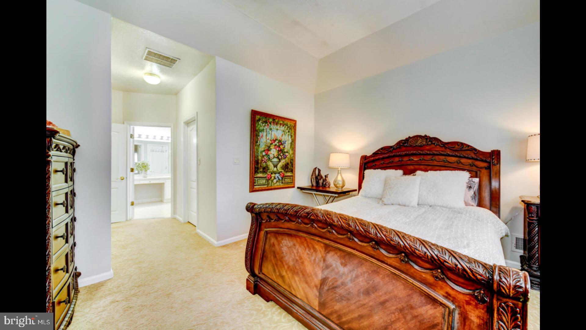 25 Cardinal Flower Lane Princeton Junction, NJ 08550 - Photo 24 of 54 a bedroom with a bed and a painting on the wall