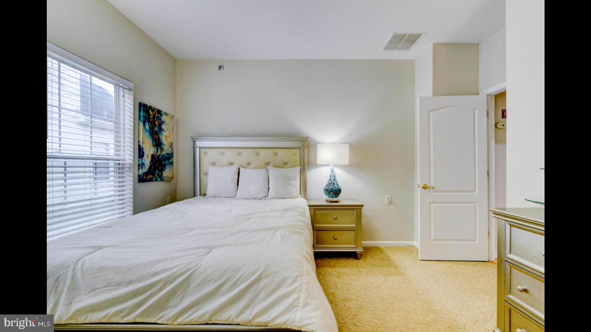 25 Cardinal Flower Lane Princeton Junction, NJ 08550 - Photo 27 of 54 a bedroom with a bed and a cabinets