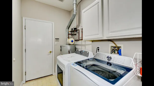 a view of a chairs and table in the patio