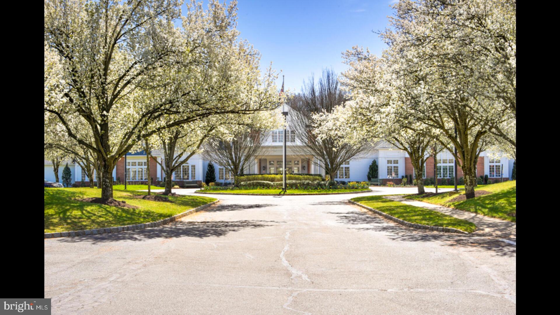 25 Cardinal Flower Lane Princeton Junction, NJ 08550 - Photo 38 of 54 a view of a house with a yard and large trees
