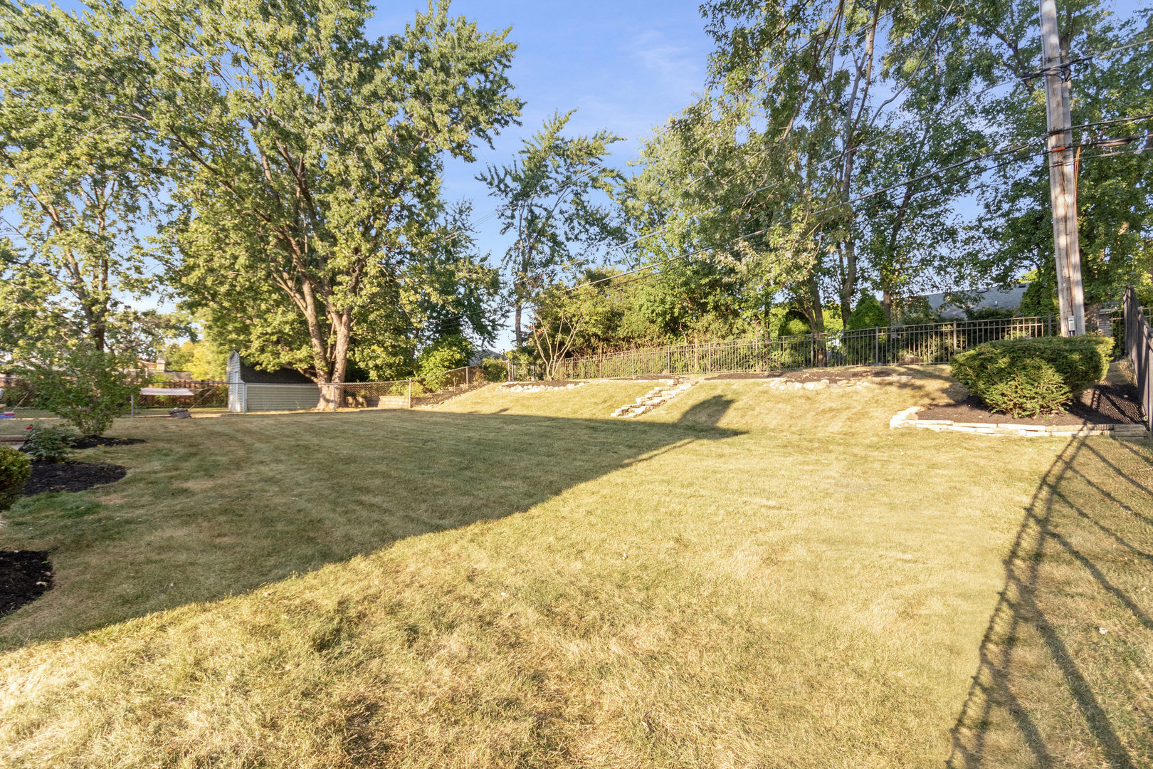 1635 Chippendale Road Hoffman Estates, IL 60169 - Photo 23 of 27 a view of back yard of the house