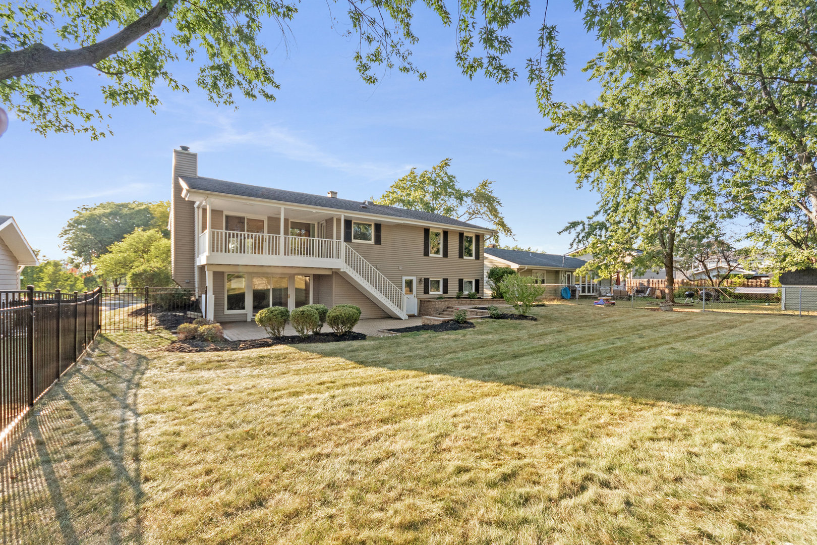 1635 Chippendale Road Hoffman Estates, IL 60169 - Photo 24 of 27 a view of a house with a yard