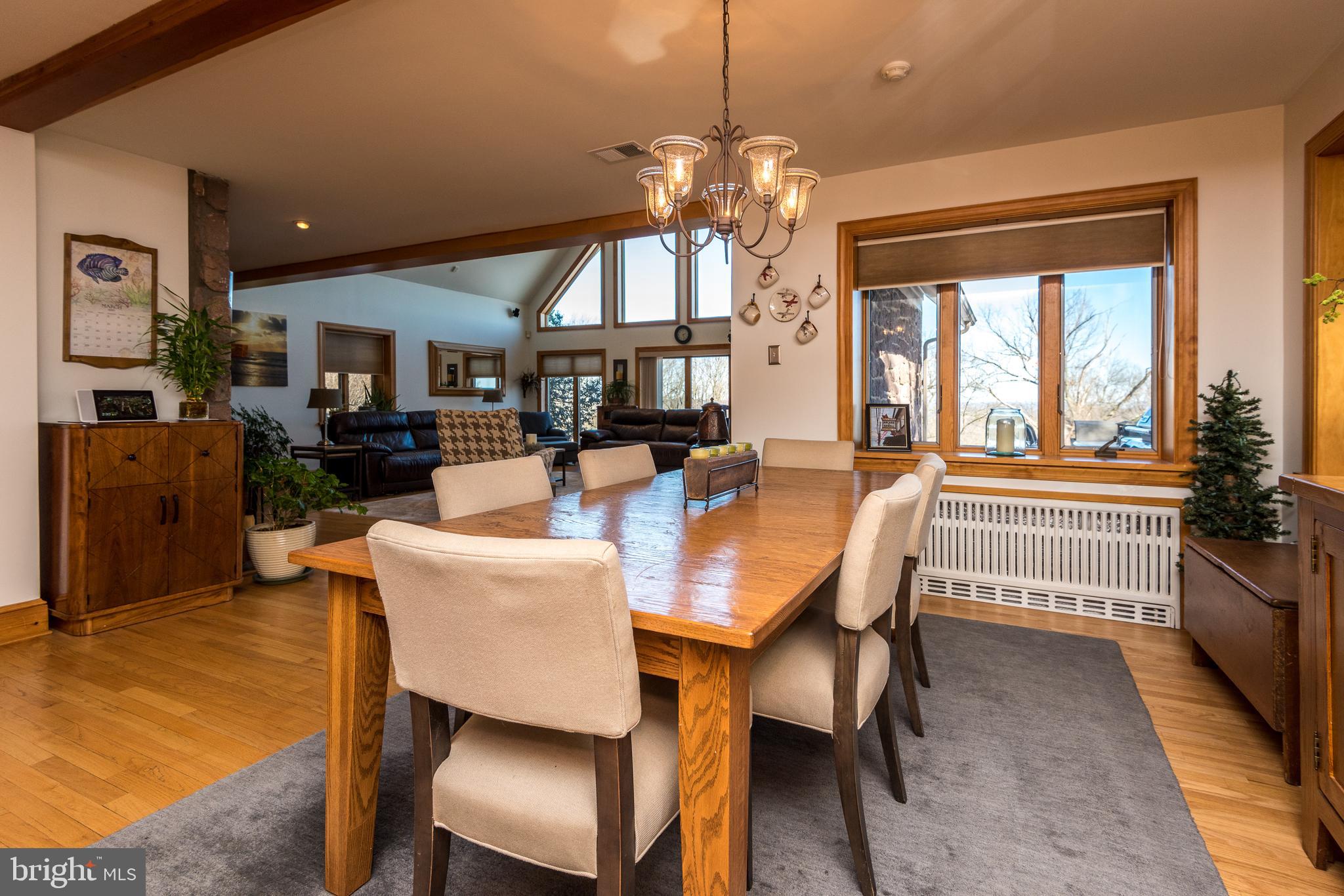 791 Temple Road Pottstown, PA 19465 - Photo 17 of 82 a dining room with furniture a chandelier and wooden floor