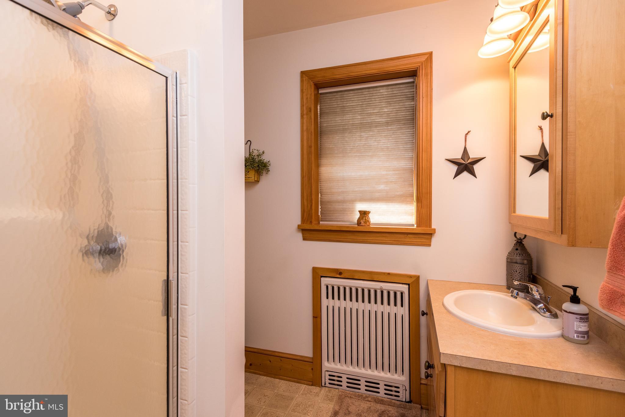 791 Temple Road Pottstown, PA 19465 - Photo 29 of 82 a bathroom with a sink and a mirror