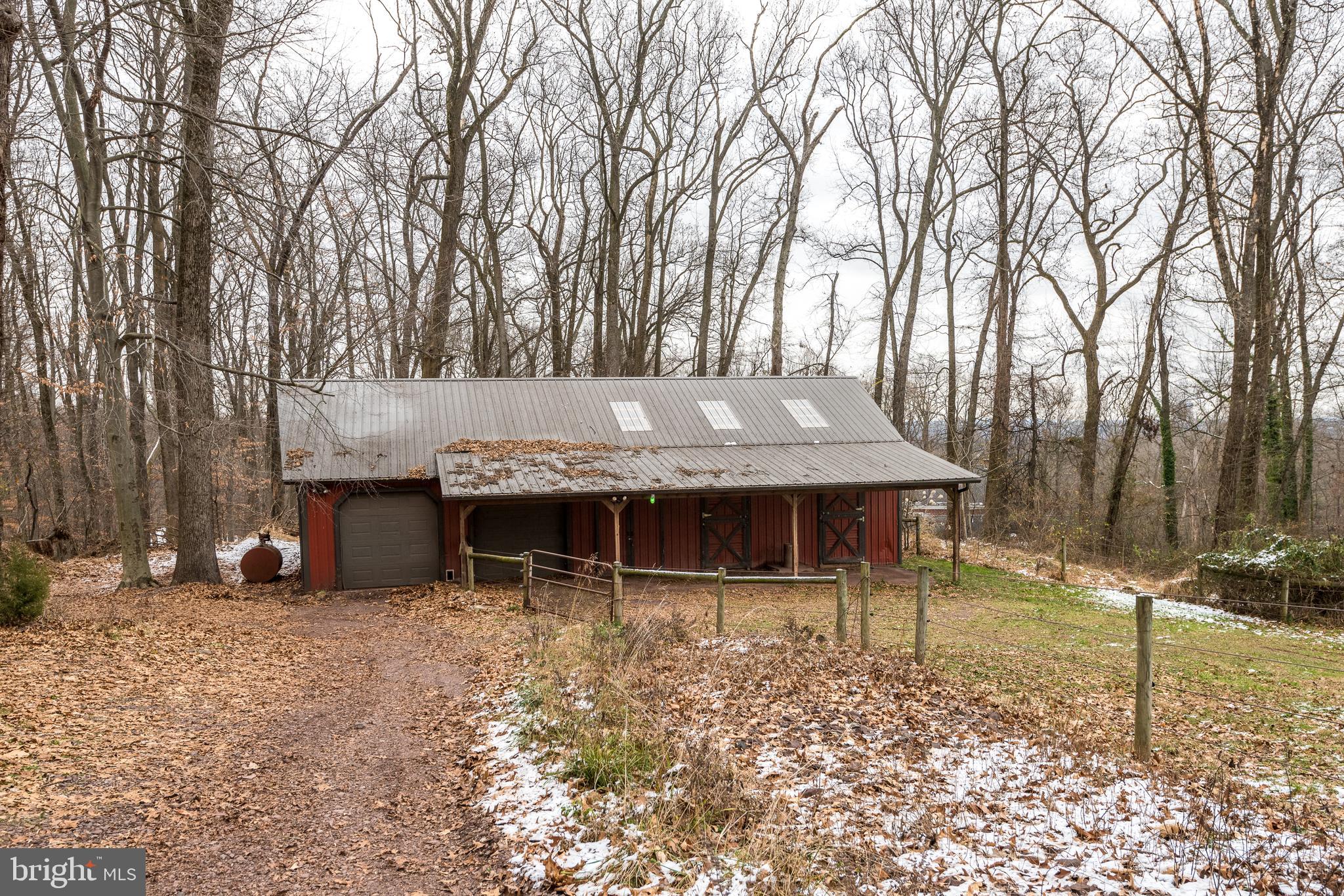 791 Temple Road Pottstown, PA 19465 - Photo 56 of 82 a backyard of a house with table and chairs