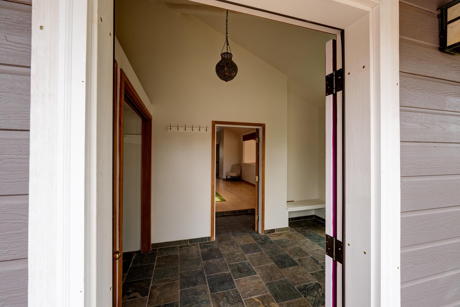 64925 McGrath Road Bend, OR 97701 - Photo 6 of 51 Generous slate entry room with 2 closets, bench seating