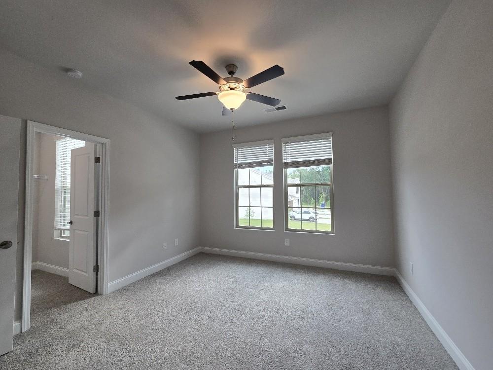 6206 Ripple Way, Unit 89 Atlanta, GA 30349 - Photo 20 of 26 a view of an empty room with a window