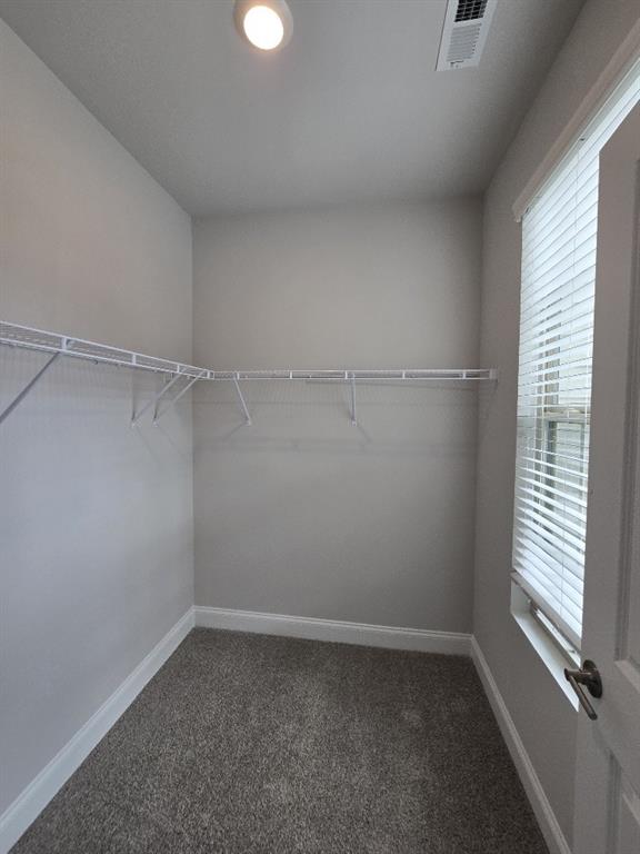 6206 Ripple Way, Unit 89 Atlanta, GA 30349 - Photo 24 of 26 wooden floor in an empty room with a window