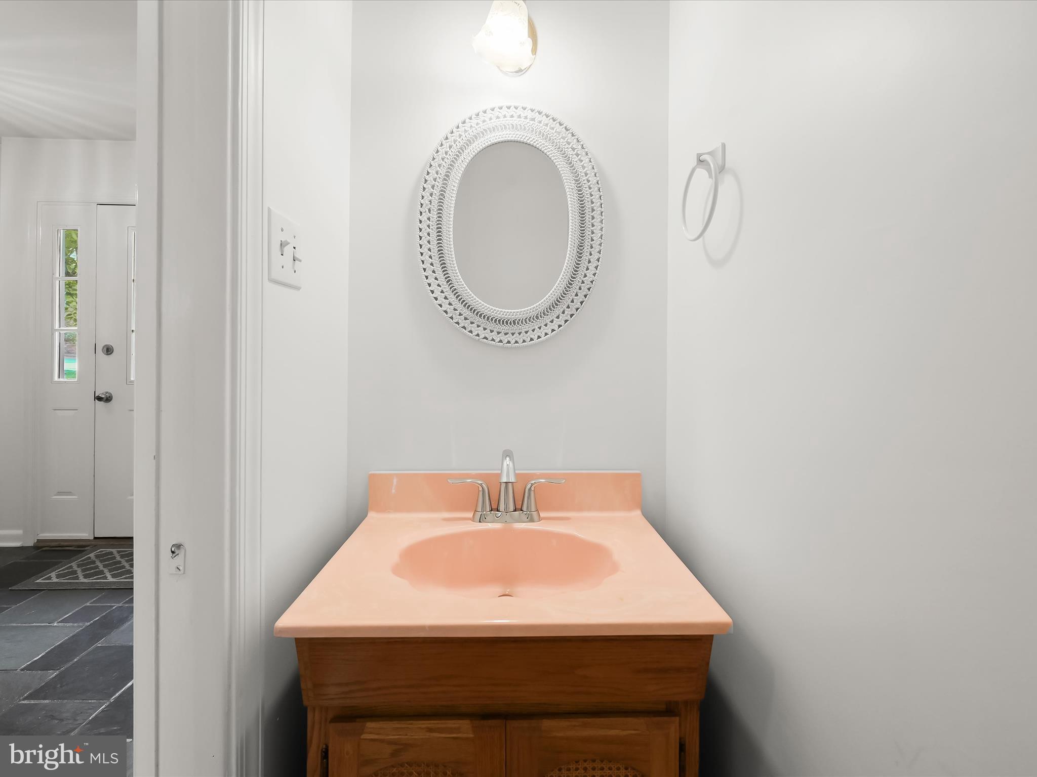 109 Hillside Road Baltimore, MD 21228 - Photo 29 of 78 Powder Room with pocket door