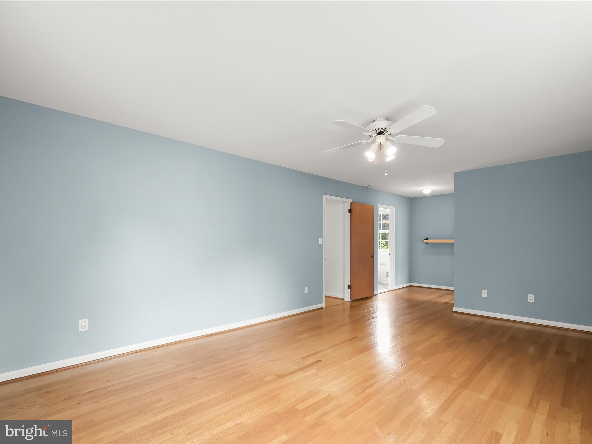109 Hillside Road Baltimore, MD 21228 - Photo 33 of 78 Primary Bedroom - walk in closet and ceiling fan