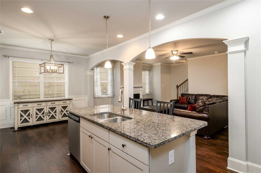 6622 Trailblazer Road Flowery Branch, GA 30542 - Photo 15 of 51 a bathroom with a granite countertop sink and a large mirror